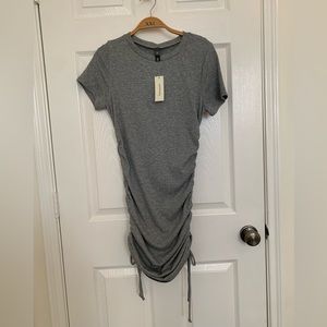 Francesca’s brand new ruched grey mini dress